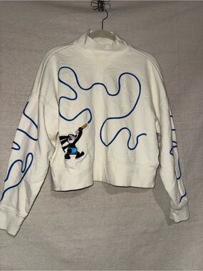 Disney Oswald Cream Sweatshirt with Black Logo Tag